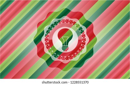 light bulb icon inside christmas style emblem.