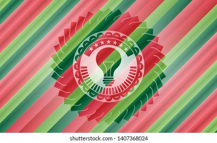 light bulb icon inside christmas emblem.