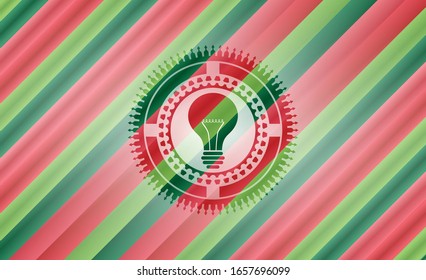 icono de la bombilla en el interior del fondo del emblema de Navidad.