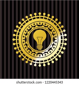 light bulb icon inside gold emblem