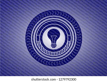 light bulb icon inside jean background