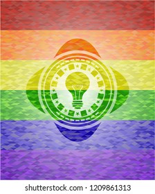 light bulb icon inside lgbt colors emblem 