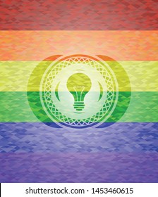 light bulb icon inside lgbt colors emblem 