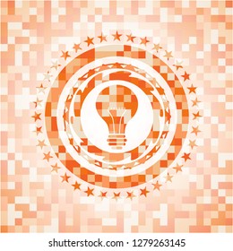 light bulb icon inside orange mosaic emblem with background