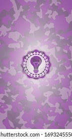 light bulb icon inside pink and purple camo emblem
