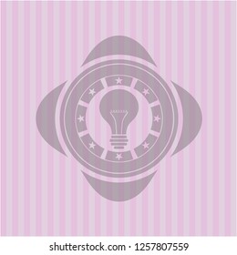 light bulb icon inside realistic pink emblem