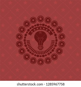 light bulb icon inside red icon or emblem