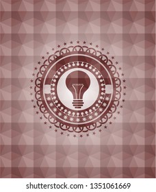 light bulb icon inside red emblem or badge with abstract geometric polygonal pattern background. Seamless.