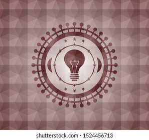 light bulb icon inside red seamless emblem or badge with abstract geometric polygonal pattern background.