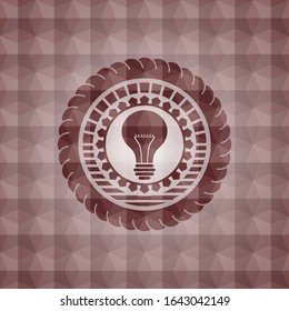 light bulb icon inside red emblem or badge with abstract geometric polygonal pattern background. Seamless.