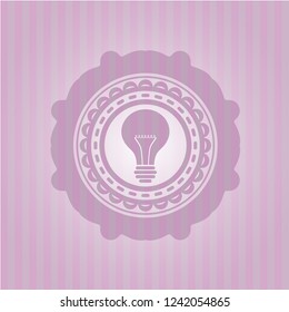 light bulb icon inside retro style pink emblem