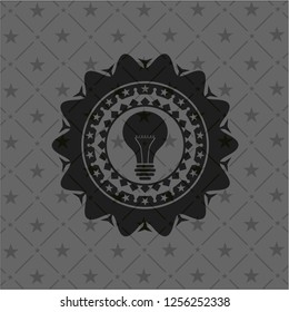 light bulb icon inside retro style black emblem