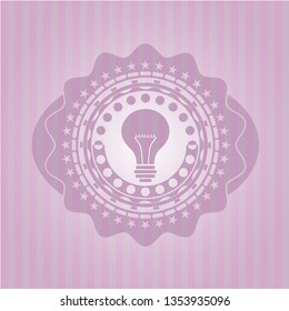 light bulb icon inside retro pink emblem