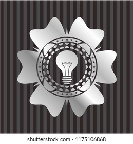 light bulb icon inside silver shiny emblem