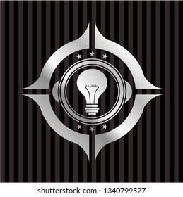 light bulb icon inside silver shiny badge