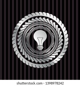 light bulb icon inside silver badge or emblem