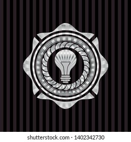light bulb icon inside silver badge