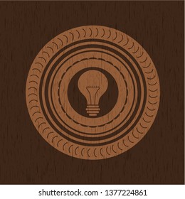 light bulb icon inside wood emblem. Retro