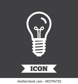 Light bulb icon. Lamp E14 screw socket symbol. Illumination sign. Graphic design element. Flat e14 lamp symbol on dark background. Vector