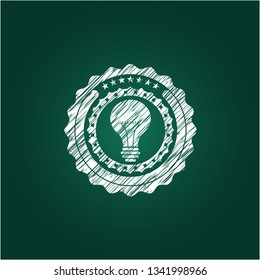light bulb icon on chalkboard