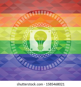 light bulb icon on mosaic background with the colors of the LGBT flag