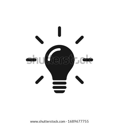 Light bulb icon with rays emanating from it