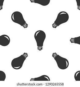 Light bulb icon seamless pattern on white background. Energy and idea symbol. Lamp electric. Flat design. Vector Illustration