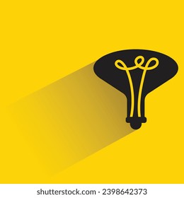 light bulb icon with shadow on yellow background
