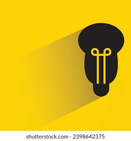 light bulb icon with shadow on yellow background