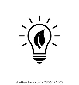 Light bulb with leaf inside black icon