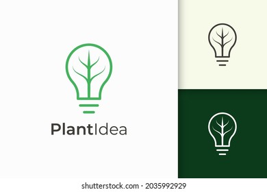 Glühbirne und Blatt-Logo in einfachem und modernem Stil repräsentieren technische Idee