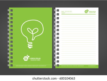 Light bulb and leaves with Green notebook template on the black background 