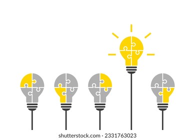 Light bulb made of jigsaw puzzle pieces as smart and outstanding idea concept. Standing out, good thinking, solution, innovation and success concept with bright yellow lightbulb symbol. 