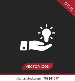 Light bulb on hand icon vector, idea symbol.