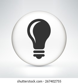 Light Bulb on White Round Button