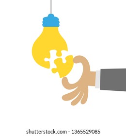 Light bulb puzzle. Hand putting the last piece. Idea concept, teamwork effort. Vector illustration.