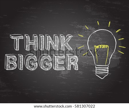 Light bulb and think bigger text on blackboard background
