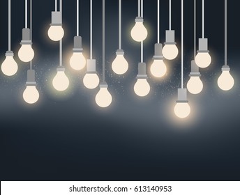 Light bulbs hanging against wall
