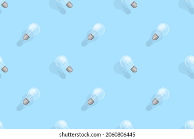 Light bulbs seamless pattern. Background on the theme of light bulbs and lighting.