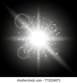 Light circle with stardust, glowing light with sparks on black background, light effect, white color