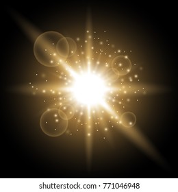 Light circle with stardust, glowing light with sparks on black background, light effect, golden color