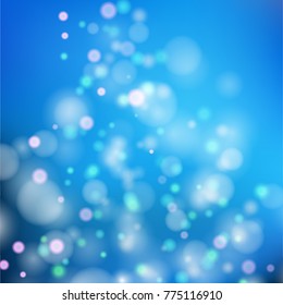Light circles fall on blue background