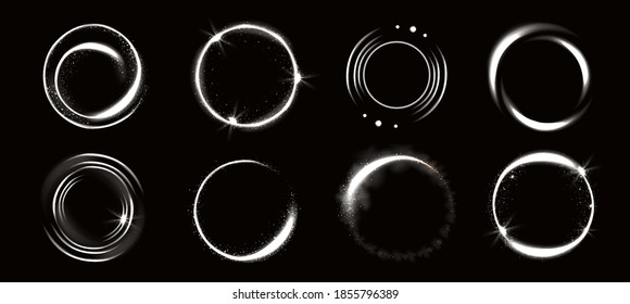 Light circles with sparkles, magic glow effect. Vector realistic set of white shiny rings and swirls, round frames of flare trail with glitter dust isolated on black background