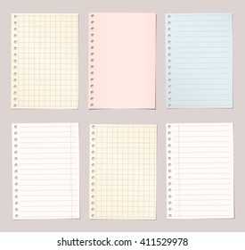 Light colorful lined and squared notebook paper are stuck on brown background