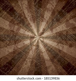 The light and dark rays on grunge background with texture of paper.