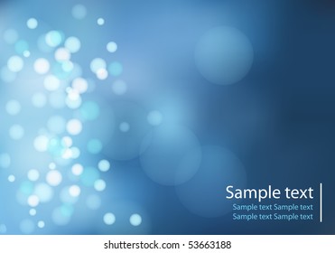 light dots on blue background with bokeh effect