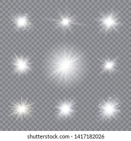Light glow effect stars. Vector sparkles on transparent background. Christmas abstract pattern. Sparkling magic dust particles.