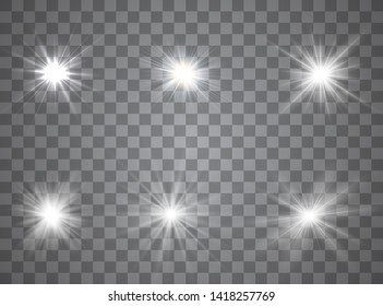 Light glow effect stars. Vector sparkles on transparent background. Christmas abstract pattern. Sparkling magic dust particles.