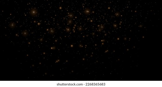The light of gold dust. Bokeh light effect background. Christmas glowing dust background Christmas glowing light bokeh confetti and glitter texture overlay for your design.