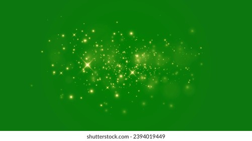 The light of gold dust, bokeh light effect background. Christmas glowing dust background, Yellow flickering glow with confetti bokeh light and particle motion. The dust sparks and golden stars shine.